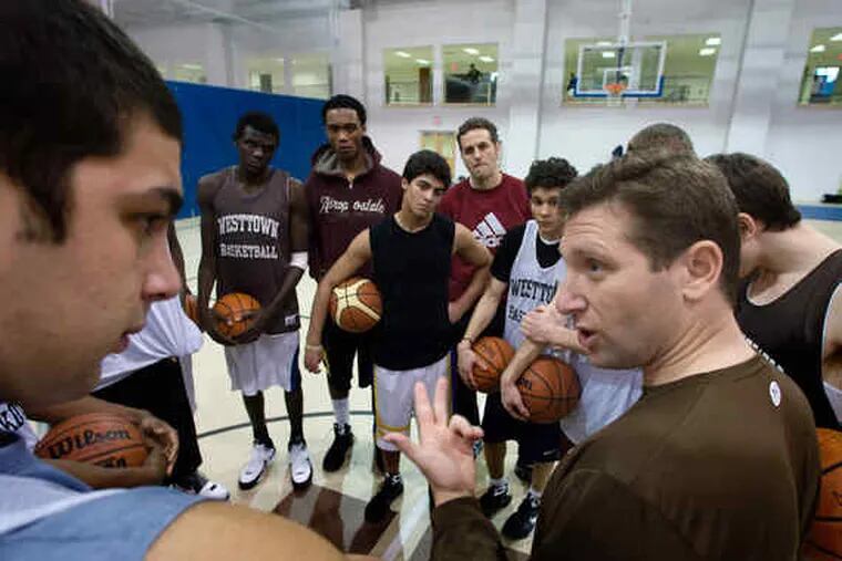 Westtown boys&#0039; basketball coach Seth Berger speaks with his team at the start of practice. Berger, once the CEO of And1, is in his second year with the Quakers. &quot;My goal would be when I&#0039;m done coaching to look back and say, &#0039;I&#0039;ve been one of the best high school coaches in America,&#0039; &quot; said Berger.