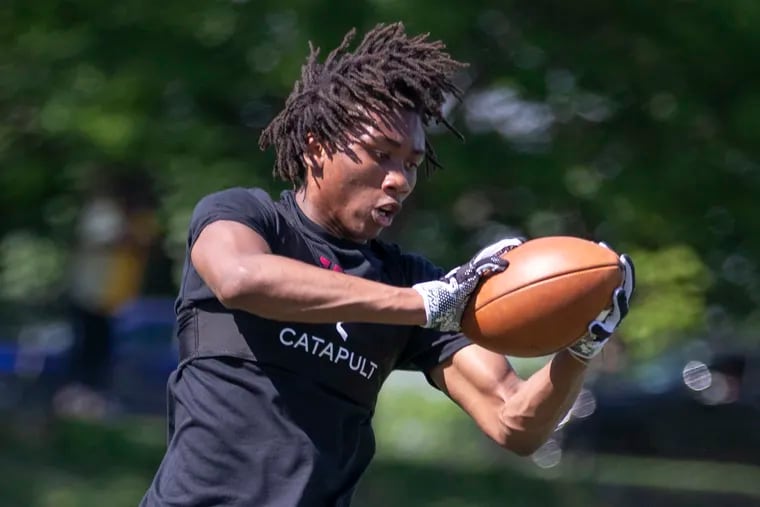 Imhotep Charter High School held a showcase event for college coaches to see their players workout on May 18, 2022. Cornerback Kenneth Woseley during drills.