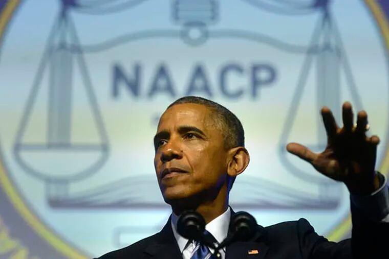 President Barack Obama addresses the 106th annual NAACP national conference. TOM GRALISH / Staff Photographer