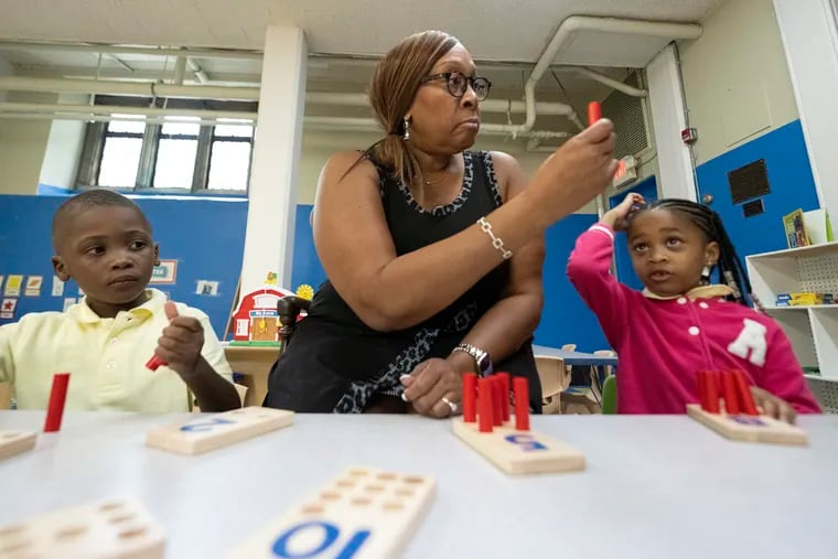 Lisa Smith, owner of Amazing Kidz Academy LLC in Philadelphia, Pa. is photographed on Tuesday, September 19, 2023, with students Djooby Oriol Pirre Volquez (left), and Dakota Frank.  Federal childcare funding will run out at the end of September, leaving over 150k PA kids set to lose care.