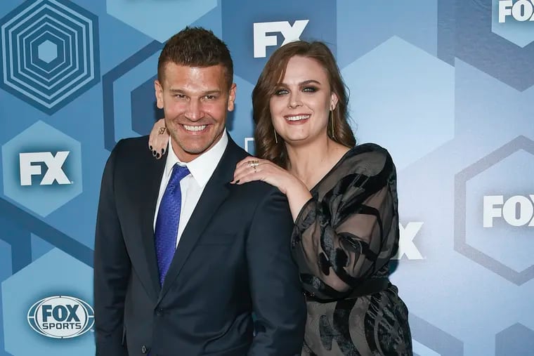 FILE - In this May 16, 2016 file photo, David Boreanaz and Emily Deschanel attend the FOX Networks 2016 Upfront Presentation Party in New York. An arbitrator has ordered 21st Century Fox to pay $179 million in a dispute over profits with the stars of the long-running Fox TV show “Bones.” Boreanaz and Deschanel, the stars of “Bones” from 2005 through 2017, sued Fox in 2015, saying it denied them profits by licensing the show to Fox’s TV division and to Hulu for below-market rates. (Photo by Evan Agostini/Invision/AP, File)