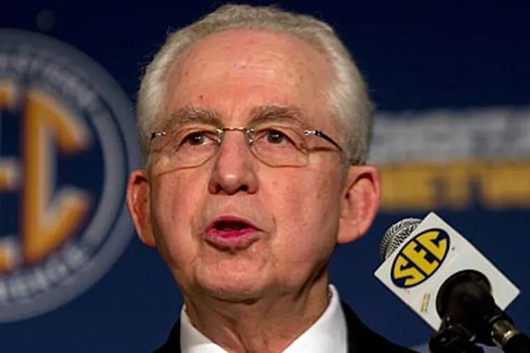 "We don't have the luxury of acting as if it's business as usual," SEC commissioner Mike Slive said. (Dave Martin/AP)