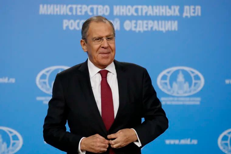 Russian Foreign Minister Sergey Lavrov prepares to leave his annual roundup news conference in Moscow, Russia, Wednesday, Jan. 16, 2019. Lavrov told a news conference that it's necessary to fully restore Syria's sovereignty, adding that Turkey's plan to create a buffer zone on the border with Syria should also be seen in that context. (AP Photo/Pavel Golovkin)