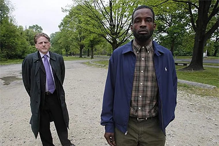 James Harris (right), with his attorney, Brian Humble, says he was forced to perform oral sex on a police officer in Fairmount Park in 2007. His civil-rights case goes to trial Monday. (Alejandro A. Alvarez / Staff Photographer)