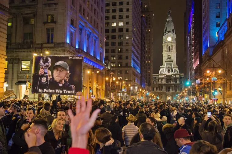 Philadelphia Eagles fans flooded Broad Street south of City Hall to celebrate the team’s NFC championship game win over the Minnesota Vikings and trip to the Super Bowl to face the New England Patriots.