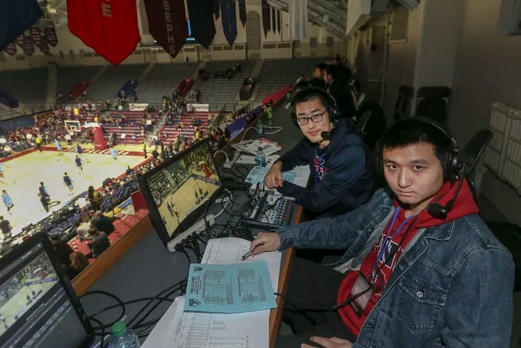 Getting ready to call the Penn-Columbia game in Mandarin were Jintao Fu (left) and Yan Wu.