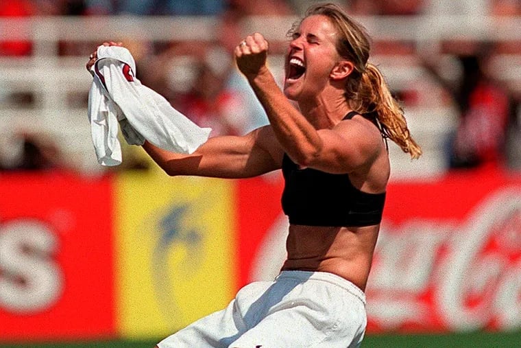 Brandi Chastain reacts to her winning penalty kick that captured the 1999 World Cup at the Rose Bowl.