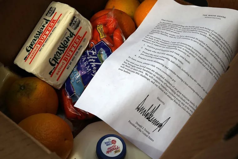 The food boxes — each weighing 35 pounds and typically containing produce, dairy products, and meats — were developed by the U.S. Department of Agriculture at the start of the pandemic, to help the increasing number of Americans in need. It does not appear that President Donald Trump’s letter, pictured here, became part of the shipments until recently.