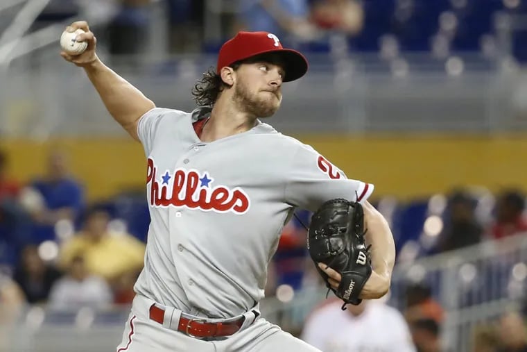 Phillies pitcher Aaron Nola delivers during the Phillies win over the Marlins on Wednesday.