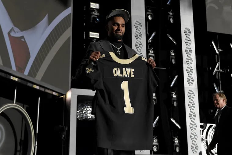 Action Network Use Only - LAS VEGAS, NEVADA - APRIL 28: Chris Olave poses onstage after being selected 11th by the New Orleans Saints during round one of the 2022 NFL Draft on April 28, 2022 in Las Vegas, Nevada. (Photo by David Becker/Getty Images)