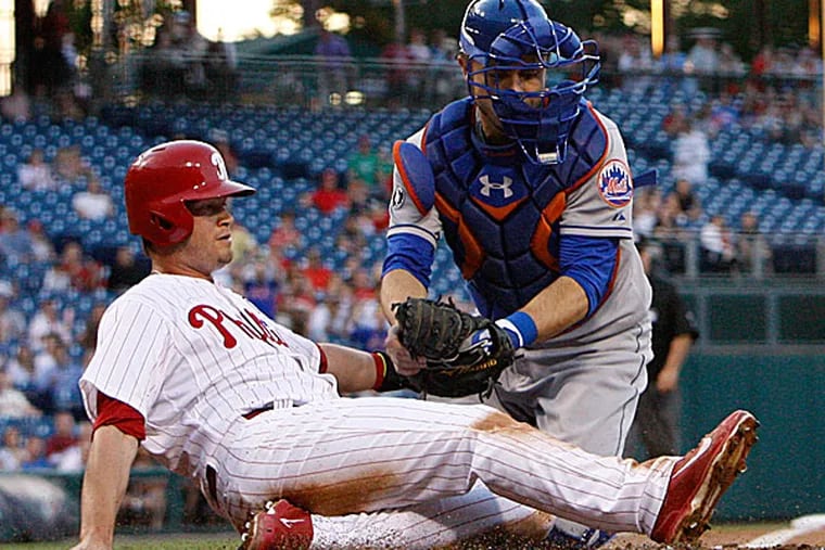 The Phillies' Reid Brignac is tagged out at home plate by Mets catcher Travis d'Arnaud. (Ron Cortes/Staff Photographer)