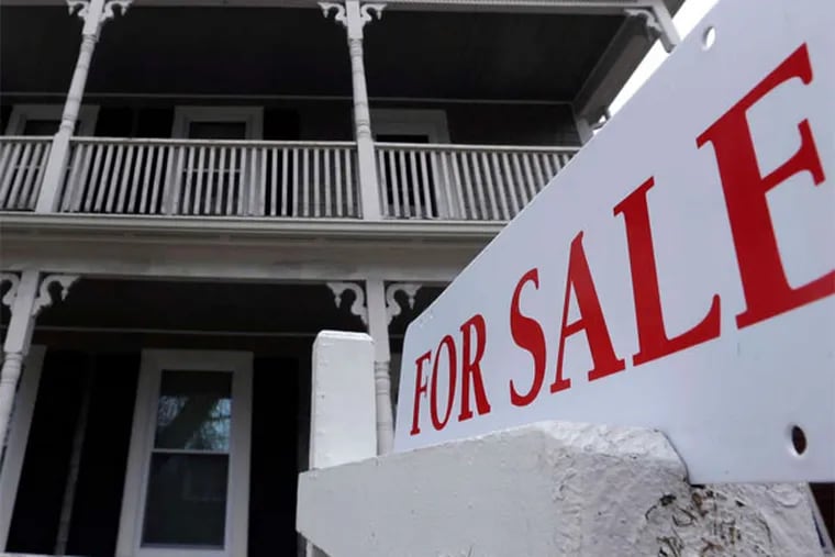 Sales of previously occupied U.S. homes dipped in March, as the supply remained tight. (Steven Senne / Associated Press)