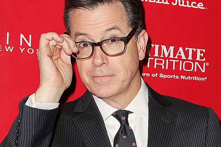 Stephen Colbert will do his last &quot;Colbert Report&quot; on Comedy Central on Dec. 18 before taking over from David Letterman on CBS' &quot;Late Night.&quot; (AMANDA SCHWAB / Starpix / AP, File)