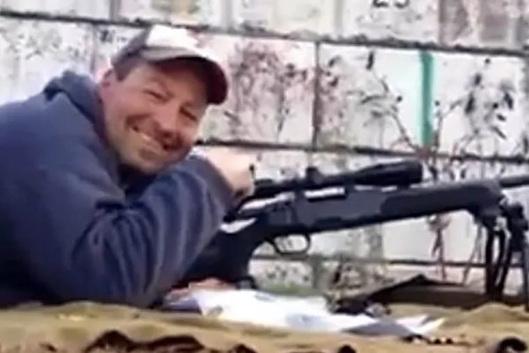 Christopher Onesti, who retired on disability seven years ago after an accident with a stapler, is seen here firing his SSG 69 recently at an Ocean Co. rifle range. (screenshot via Youtube)