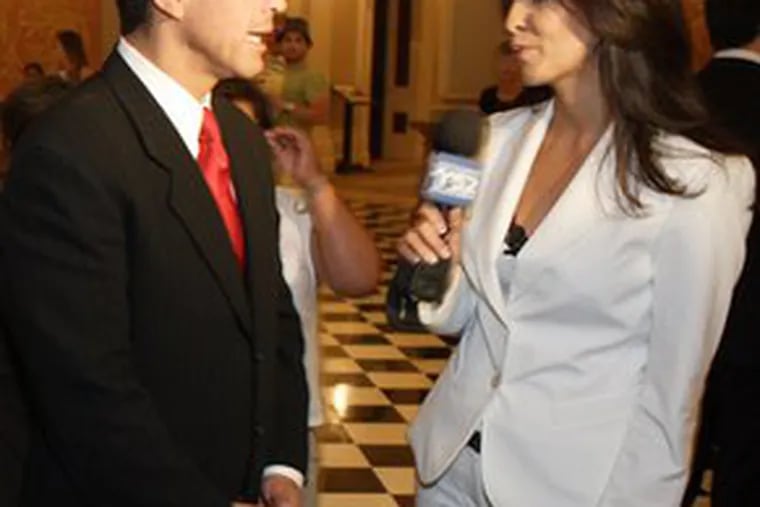 L.A. Mayor Antonio Villaraigosa , husband of Corina, with TV reporter and paramour Mirthala Salinas.