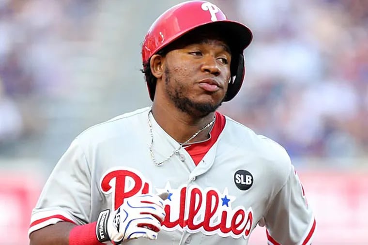 Philadelphia Phillies third baseman Maikel Franco (7) rounds the bases after hitting a solo home run against the New York Yankees during the first inning at Yankee Stadium.