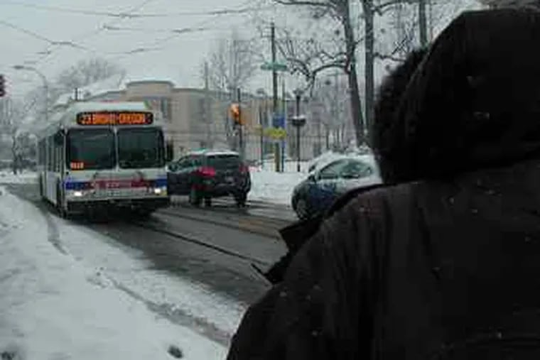 A series of snow-related detours made the nation's longest city bus route, here on Germantown Avenue in Chestnut Hill, even longer.