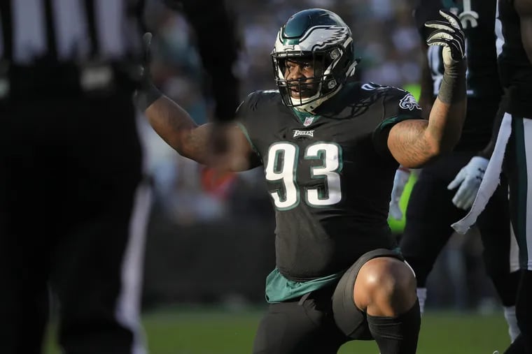 Eagles defensive tackle Tim Jernigan tries to get the crowd into the game during the third quarter against the Giants.