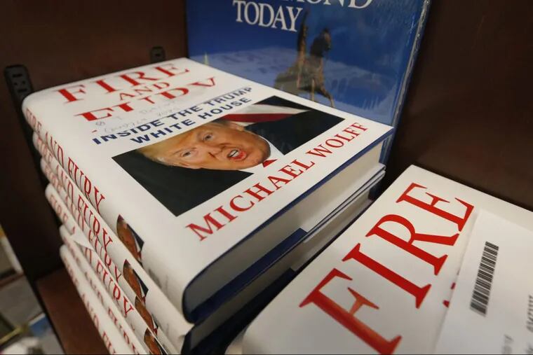 A stack of “Fire and Fury” books by writer Michael Wolff sit on a shelf in a bookstore. The new book on President Donald Trump is drawn from what he said was regular access to the West Wing and more than 200 interviews, including some three hours with Trump himself.