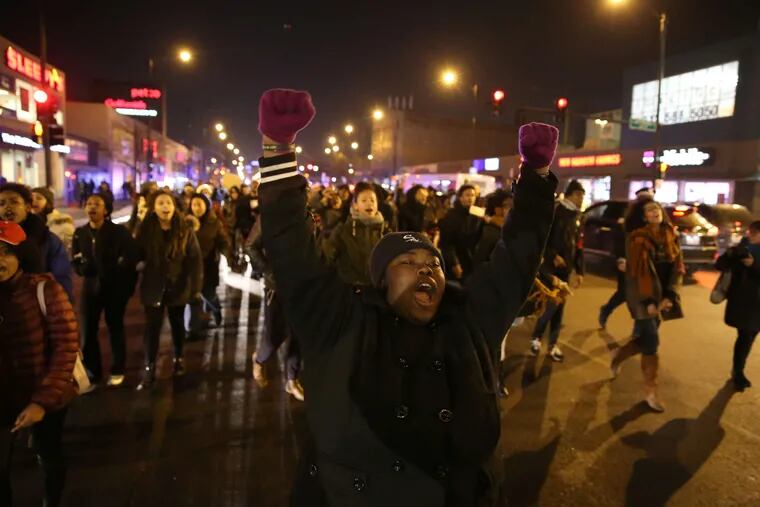 Demonstrators fill the street in Chicago near Halsted Street and Roosevelt Road after the release of a 2014 video showing Laquan McDonald being shot by Police Officer Jason Van Dyke.