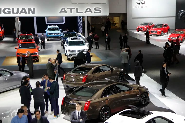Overview of the Cadillac, Volkswagen and Infiniti display, Tuesday, Jan. 15, 2019, at the North American International Auto Show in Detroit.