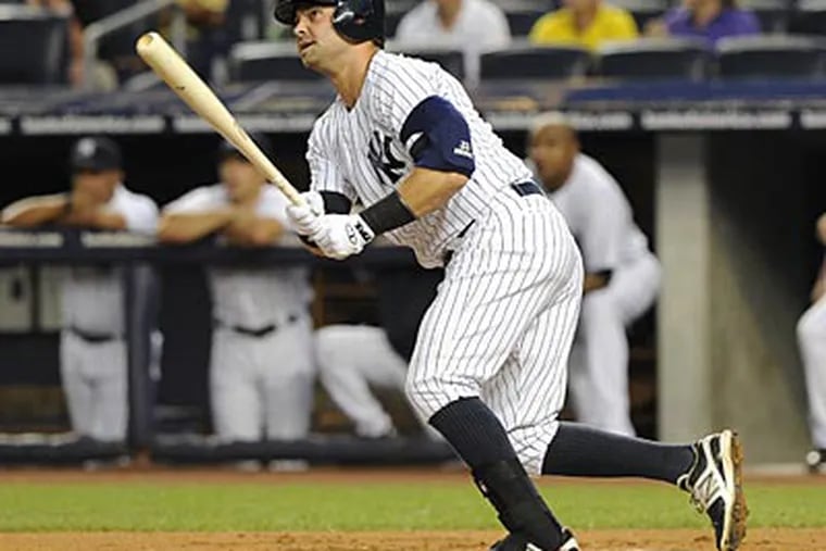 Nick Swisher, 31, is a good rightfielder who also can play first
base. (Kathy Kmonicek/AP)