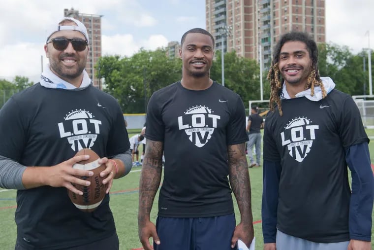 Jaelen Strong (center) poses with Texans teammates Tom Savage (left) and Will Fuller during Strong’s football camp on Saturday.