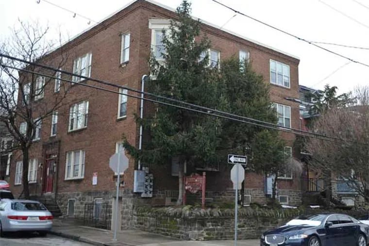 The Philadelphia Housing Authority will spend more than $1 million to renovate this vacant apartment building on Queen Lane into 29 units. (Ron Tarver / Staff Photographer)