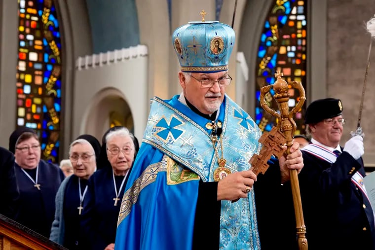 Ukrainian Catholic Archbishop Emeritus Stefan Soroka arrives for a prayer service at the Ukrainian Catholic Cathedral of the Immaculate Conception on Sunday.