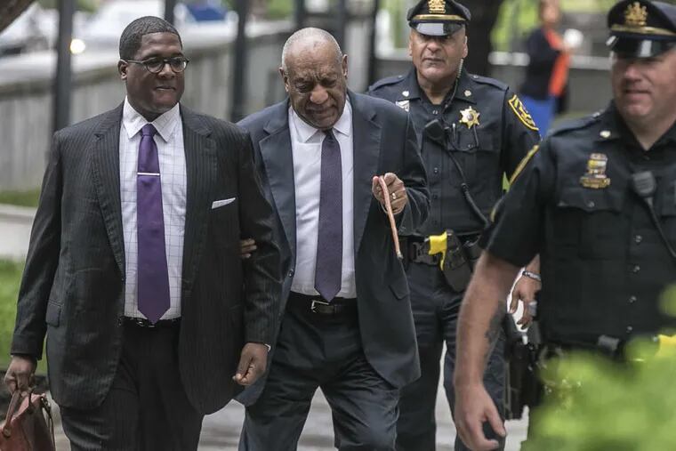 Tuesday June 6, 2017 Bill Cosby reacts to a fan who shouted to him that it is her birthday as he and an aide walk into the Montgomery County Courthouse in Norristown, Pa., for Day 2 of his sexual assault trial.