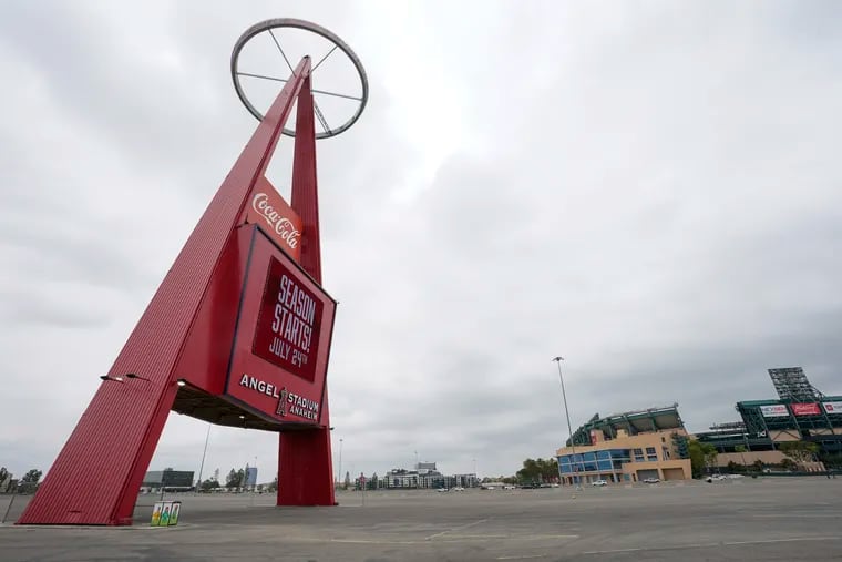 A sign outside Angels Stadium in Anaheim, Calif., announces Opening Day as July 24. The Angels and other Major League Baseball teams have reported to their respective facilities for training, amid the coronavirus pandemic.