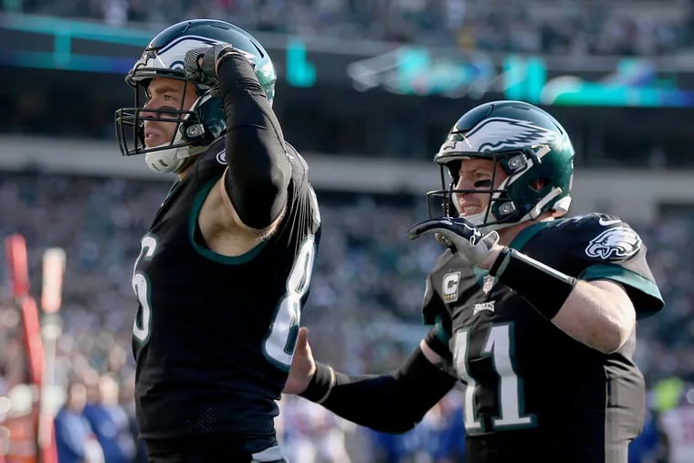 Eagles tight end Zach Ertz (86) celebrates a touchdown with quarterback Carson Wentz (11) in the second quarter of a game against the New York Giants at Lincoln Financial Field in South Philadelphia on Sunday, Nov. 25, 2018. TIM TAI / Staff Photographer