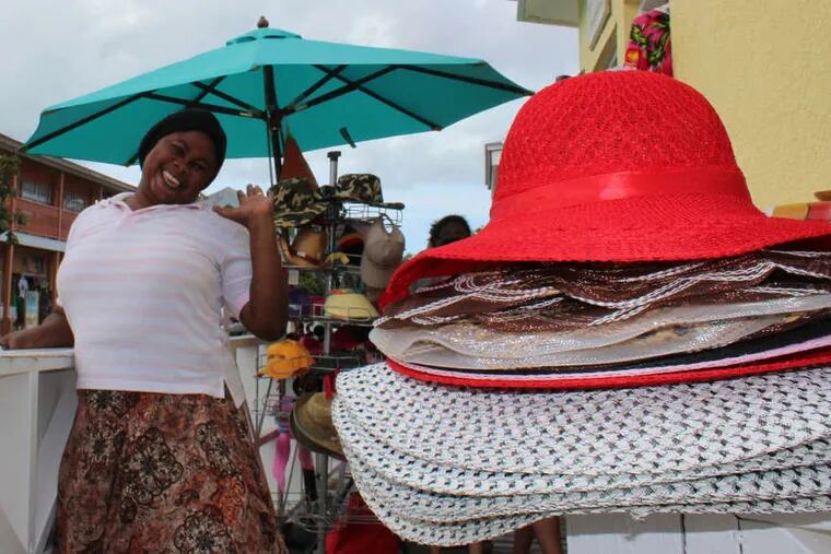 A merchant displays her wares in Cockburn Town, capital city of the Turks and Caicos, but really more of a village.