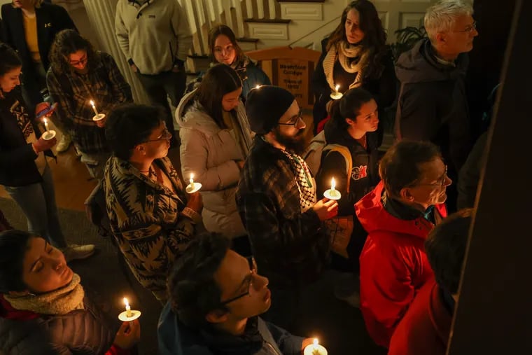 Students and Haverford community members at a candlelit vigil at Haverford College for the Palestinian student who was shot in Vermont last weekend. Photographed on Tuesday, Nov. 28, 2023.