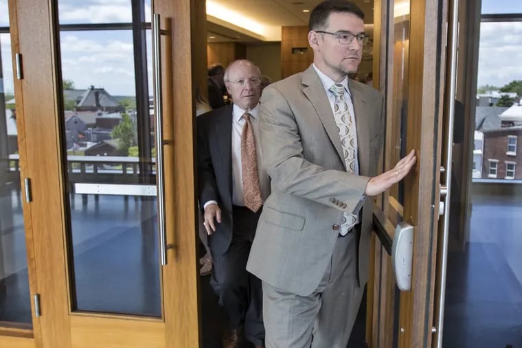 On May 23, 2018, former Sean Kratz attorney,Craig Penglase, right, walks out of Courtroom 420 at the Bucks County Justice Center, followed by his lawyer, Marc Steinberg, left, after a hearing regarding Kratzâ€™s and DiNarodo's confession tapes, which were leaked last week by Penglase. Penglase is now officially off the case.