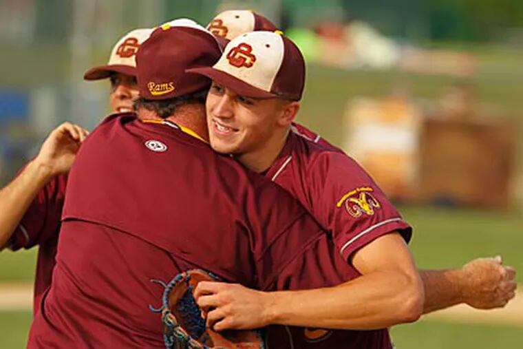 Gloucester's winning pitcher Cody Brown celebrates the victory over Holy Cross. (Ron Cortes/Staff Photographer)