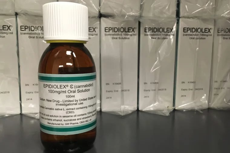FILE – This May 23, 2017 file photo shows GW Pharmaceuticals' Epidiolex, a medicine made from the marijuana plant but without THC. Investors are craving marijuana stocks as Canada prepares to legalize pot next month, leading to giant gains for Canada-based companies listed on U.S. exchanges.