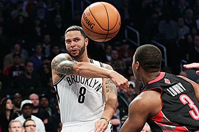 Nets guard Deron WIlliams score 19 points during the win over the Raptors. (Frank Franklin II)