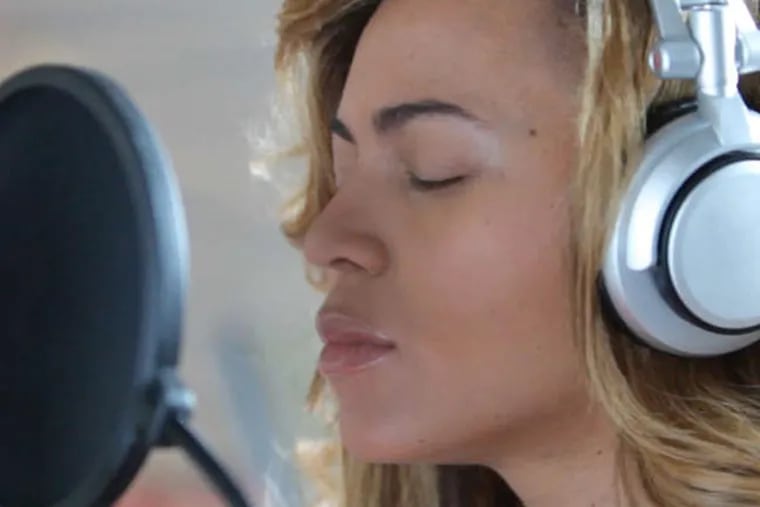 Beyonc&#0233; is shown at a recording session during the HBO documentary, touted as an intimate look at the performer's life.