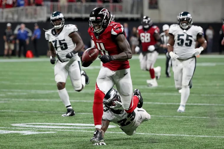 Atlanta Falcons wide receiver Julio Jones get by Eagles free safety Rodney McLeod on his way to score a 4th quarter touchdown. Philadelphia Eagles lost 24-20 to the Atlanta Falcons in Atlanta, GA on September 15, 2019. .