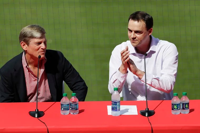 Majority partner John Middleton, left, and general manager Matt Klentak at the introductory press conference for Bryce Harper on March 2 at Spectrum Field in Clearwater, Fla.