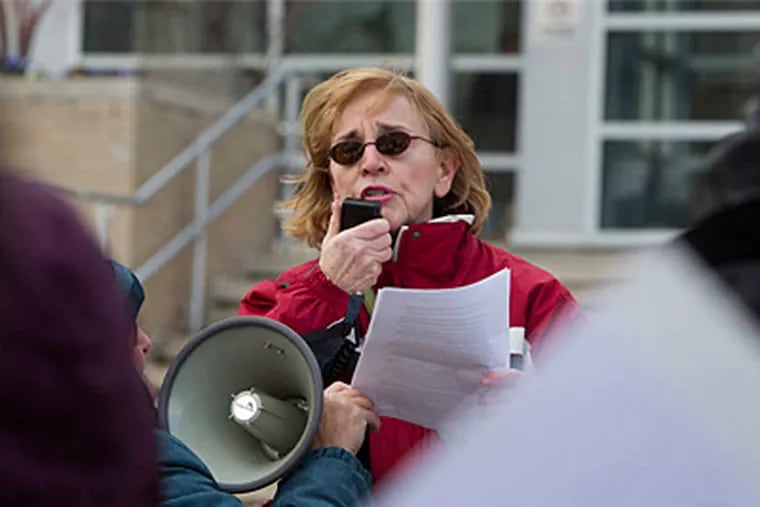 Eileen DiFranco addresses fellow protesters. DiFranco kept her job at Roxborough High School, but she was outraged at the way her School District colleagues were being treated.