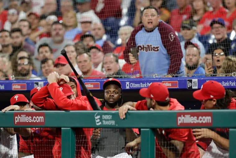 Phillies Roman Quinn watches Atlanta Braves Rafael Ortega's second-inning flying bat land in the Phillies dugout on Monday, September 9, 2019 in Philadelphia.