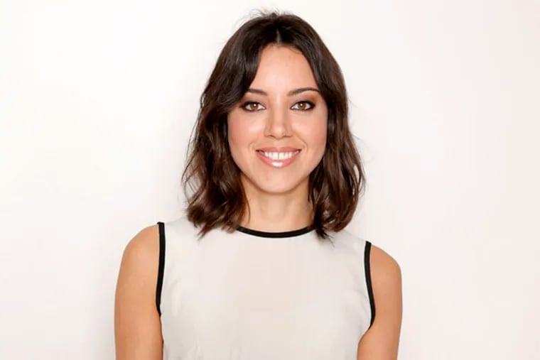 This Sunday, July 14, 2013 photo shows Aubrey Plaza from the cast of "The To Do List" at the Four Seasons Hotel in Los Angeles.  The comedy revolves around a Boise teenager named Brandy Klark, played by Plaza, a valedictorian of the Class of 1993, who creates a "to do" list of the things she missed out on in high school. The film releases Friday, July 26, 2013. (Photo by Todd Williamson/Invision/AP)