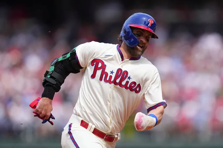 Bryce Harper of the Philadelphia Phillies runs to third base on his way to scoring a run in the bottom of the fourth inning against the Boston Red Sox at Citizens Bank Park on May 7, 2023 in Philadelphia, Pennsylvania. The Phillies defeated the Red Sox 6-1. (Photo by Mitchell Leff/Getty Images)