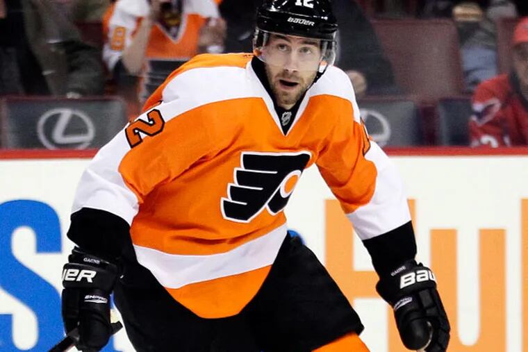 His agent has not had any discussions with Flyers general manager Paul Holmgren, he said, but Simon Gagne would like to remain a Flyer. (Tom Mihalek/AP)
