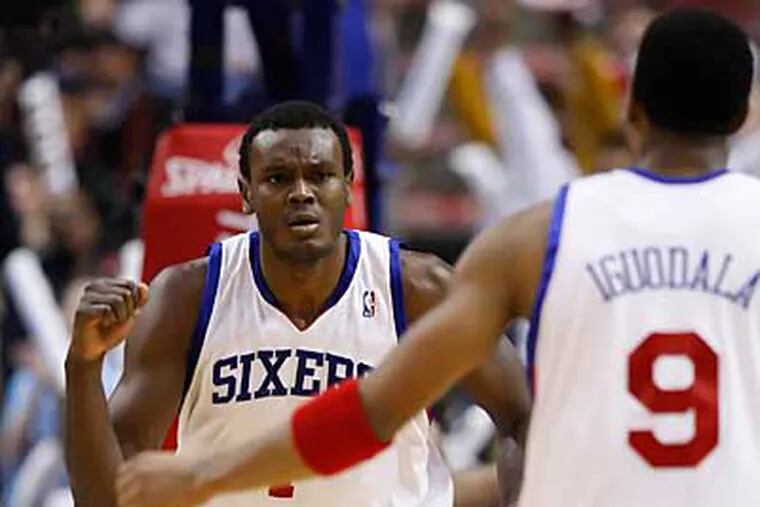 Sixers Samuel Dalembert, left, and Andre Iguodala, right, have been mentioned in trade rumors. (Ron Cortes / Staff Photographer)