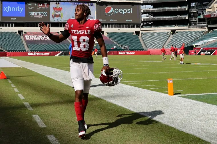 Temple quarterback D'Wan Mathis waves to fans while exiting the field after his team defeated Wagner, 41-7, at Lincoln Financial Field in Philadelphia on Saturday, Sept. 25, 2021.
