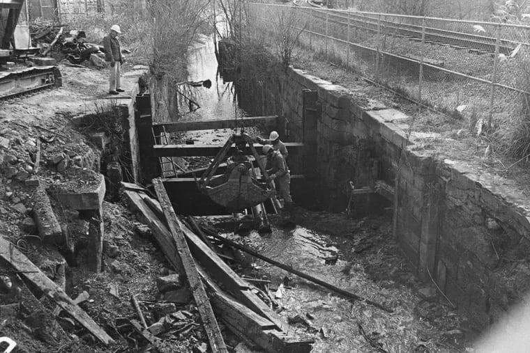 Men working on Lock 69 in the 1970s when the tow path was built along Manayunk Canal.