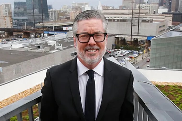 John A. Fry, president of Drexel University, stands on the roof of the Lebow Business School. He received a new five-year contract to lead Drexel until 2028
